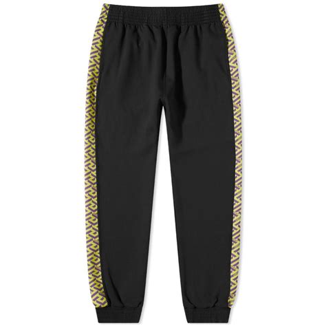 versace pants boots|Versace track pants.